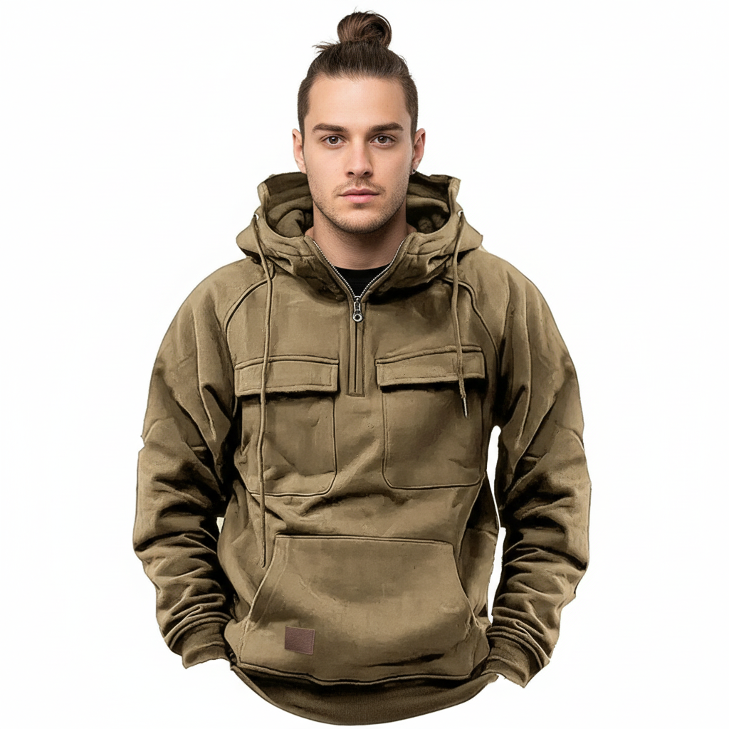 Manlig modell med manbun i taktisk hoodie